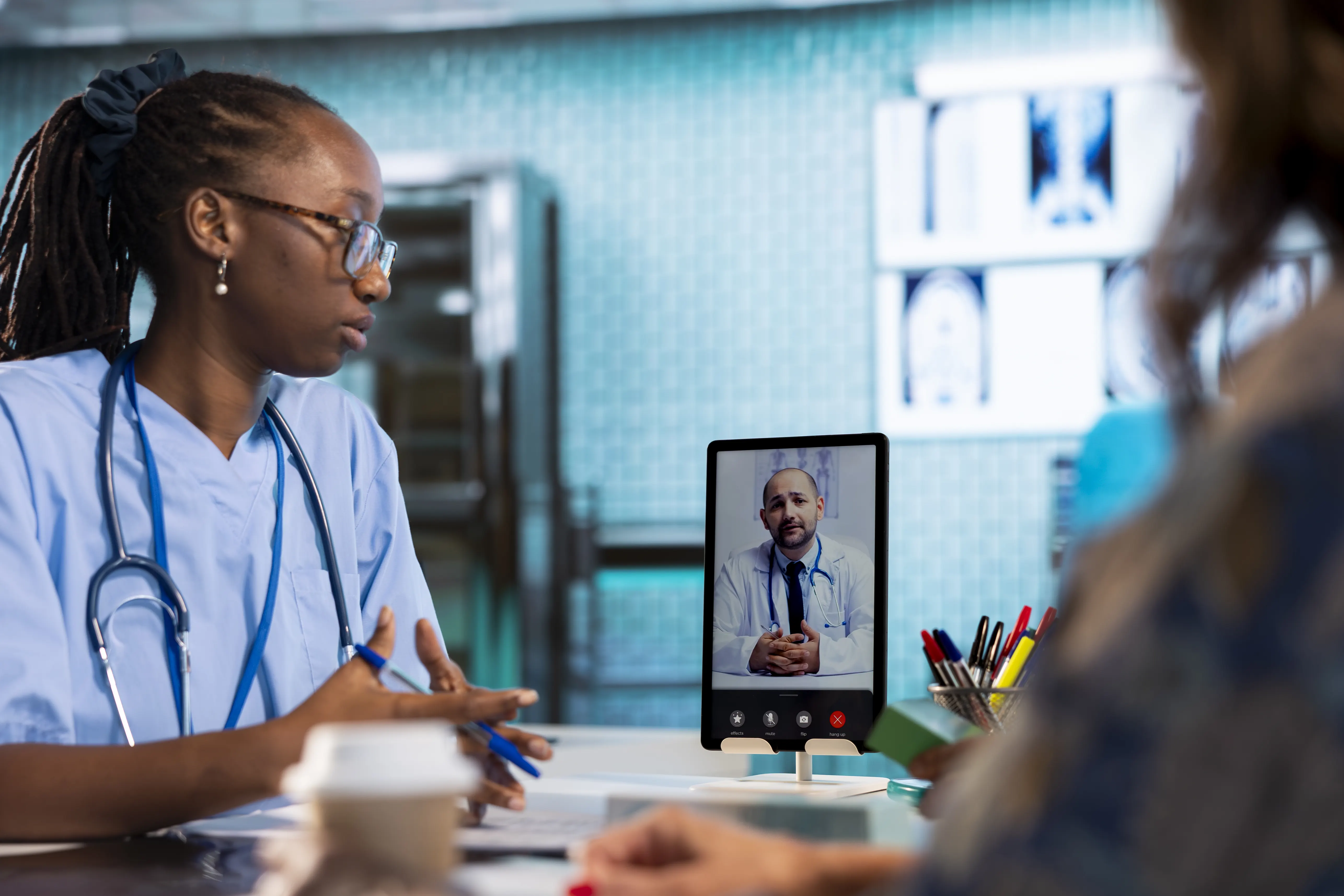 Nurse arranging an online medical consultation
